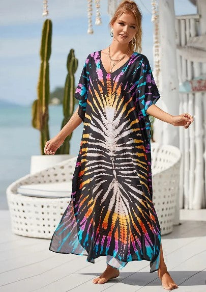 "Vackra boho långklänning med livfullt regnbågstryck, mjukt draperande passform, perfekt för stil och komfort."