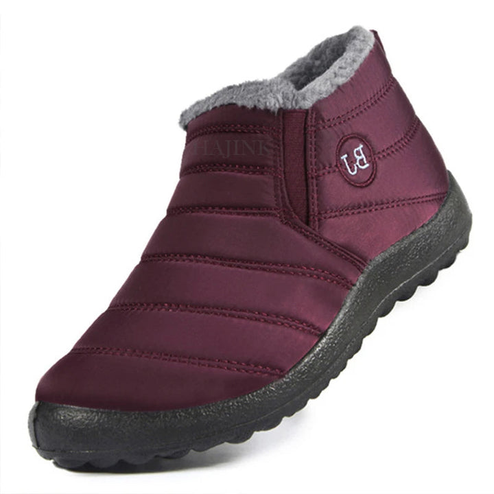 "Vattenavvisande herr vinter slip-ons med fleecefoder och robust gummisula, perfekt för stil och komfort i alla väder."