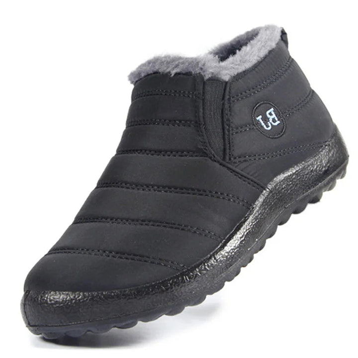 "Vattenavvisande herr vinter slip-ons med fleecefoder och robust gummisula, perfekt för stil och komfort i alla väder."