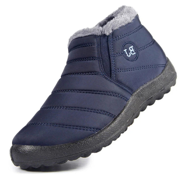 "Vattenavvisande herr vinter slip-ons med fleecefoder och robust gummisula, perfekt för stil och komfort i alla väder."