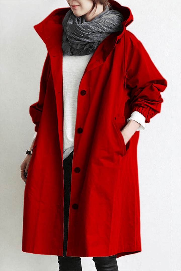 "Vattentålig damtrenchcoat med huva, klassisk design, idealisk för regniga dagar, bakifrån, stilfull och praktisk."