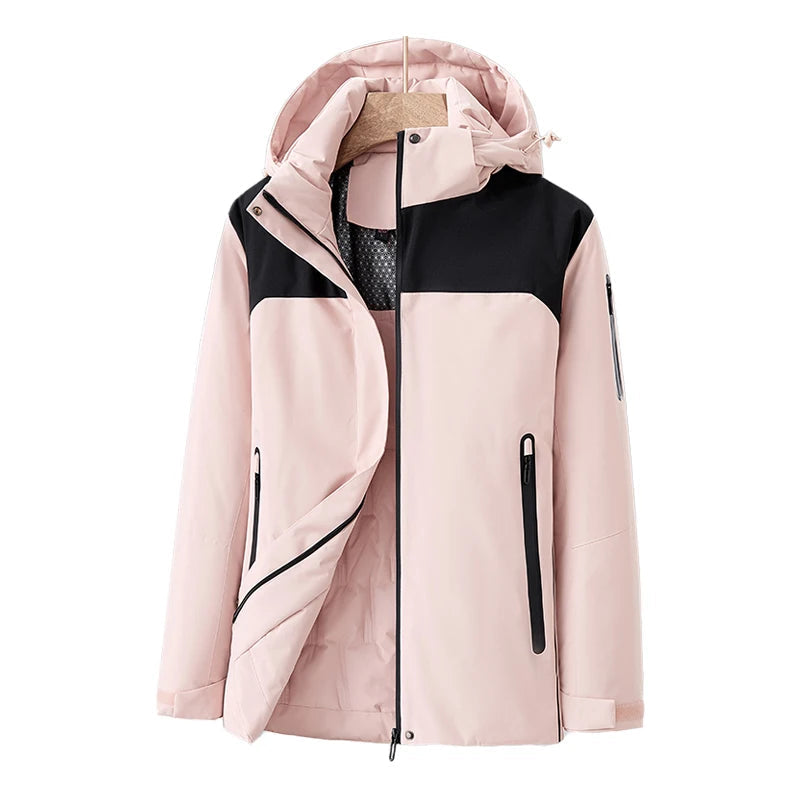 Vattentät damjacka i blå kvilt med avtagbar hätta, fickor, modern stil, perfekt för vinter och dåligt väder.
