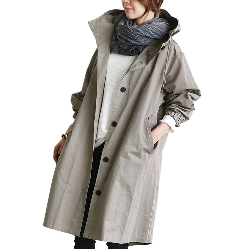 "Vattentät damjacka trenchcoat med modern design, elegant snitt och klassiska detaljer för vardagsbruk."
