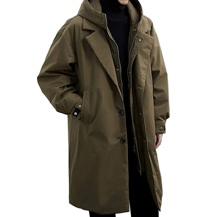 Vattentät pufferjacka trenchcoat för män, lång och elegant, perfekt för vintern, med stilfull design och värmande isolering.
