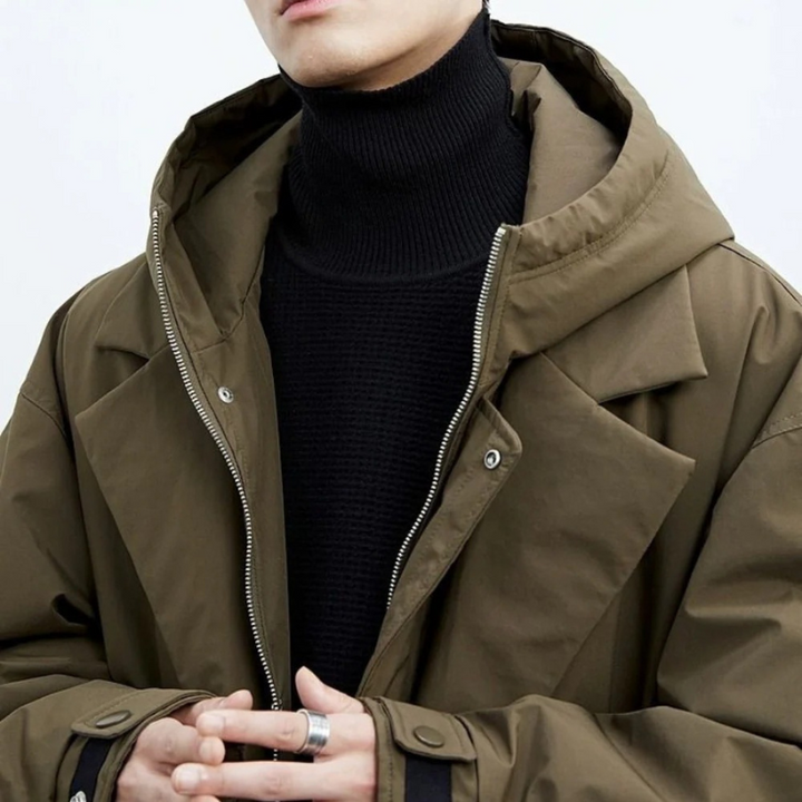 Vattentät pufferjacka trenchcoat för män, lång och elegant, perfekt för vintern, med stilfull design och värmande isolering.