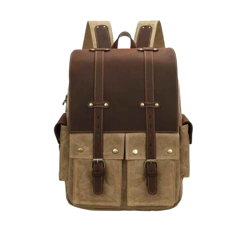 "Vintage kameraryggsäck i vaxad bomull och läder, herrmodell. Stilren design med bruna läderdetaljer och klassisk look."