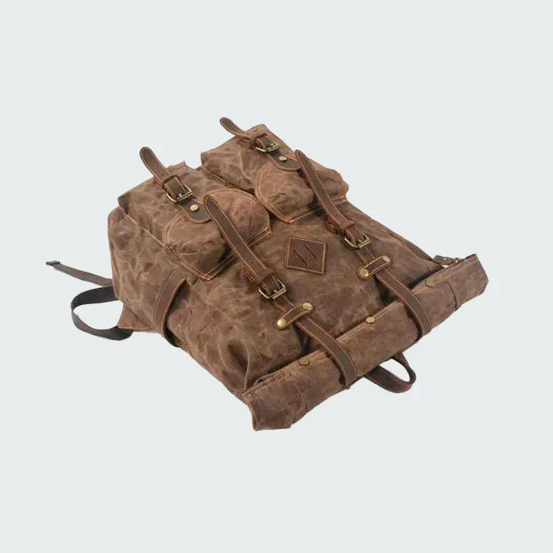"Vintage stil rulltopp ryggsäck för män i vattentåligt material med läderdetaljer och flexibel förvaring, perfekt för äventyr
