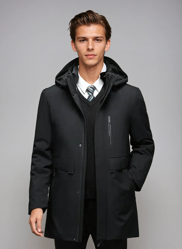 Vinter parka för herrar med huva och fickor, väderbeständigt material, stilren design, perfekt för kalla dagar.
