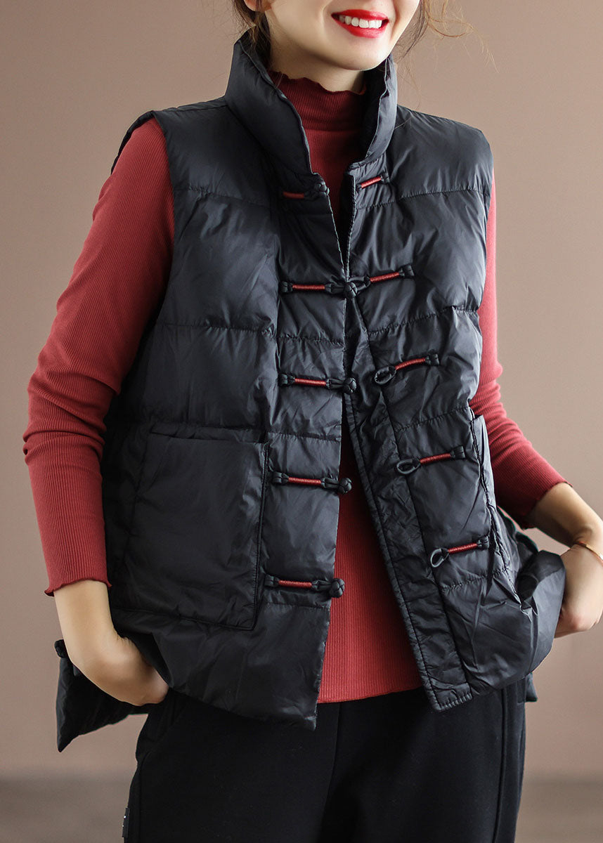 Vinter puffer västa med ståkrage och fickor, framsida, unisex design för skydd mot kyla och praktisk vardagsanvändning.