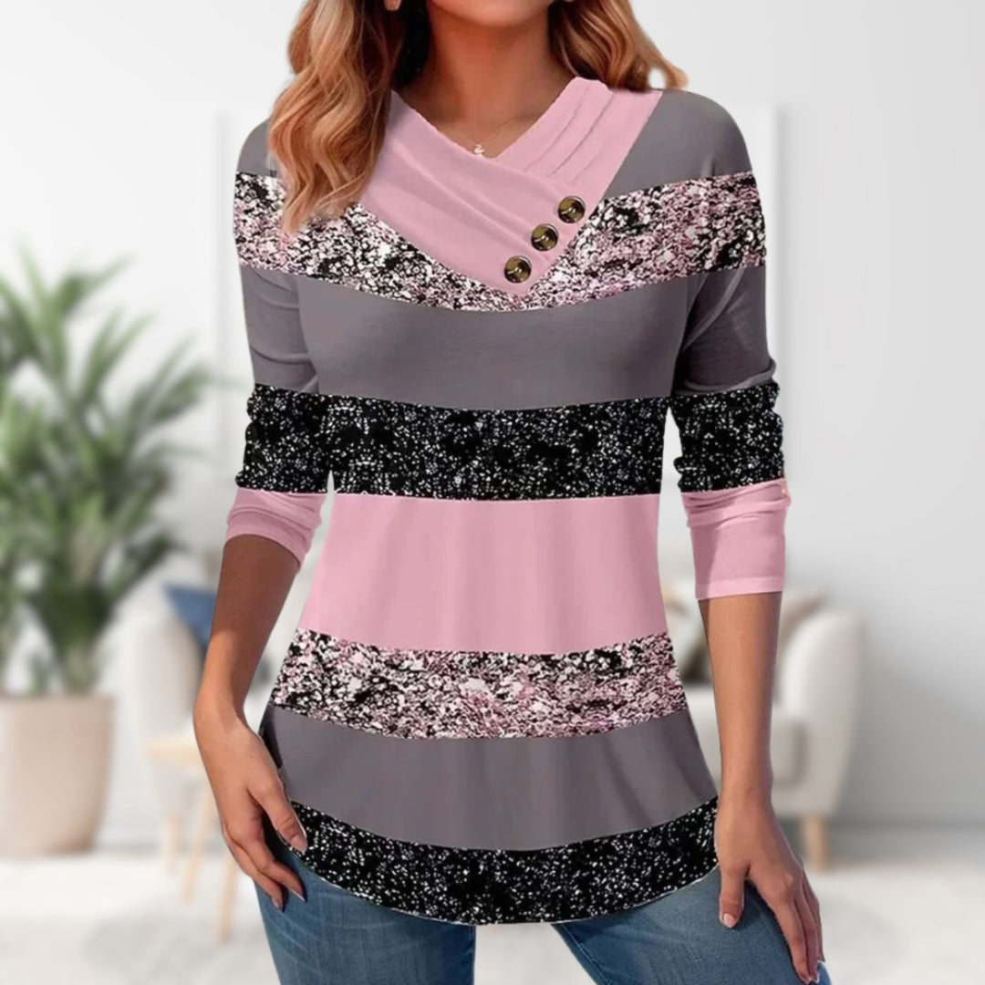 "V-ringad damtröja i mjukt material, stilren design, feminin look, passar alla kroppstyper och tillfällen."