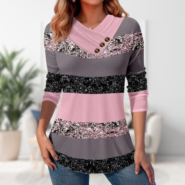 "V-ringad damtröja i mjukt material, stilren design, feminin look, passar alla kroppstyper och tillfällen."
