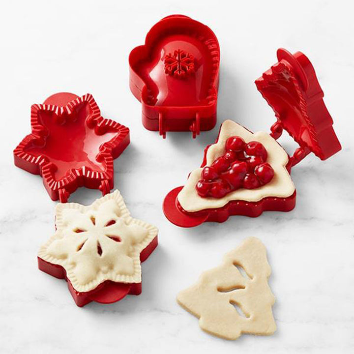 "ABS-plast julbakformar i olika former som snöflinga och julgran, perfekt för enkel och festlig bakning."