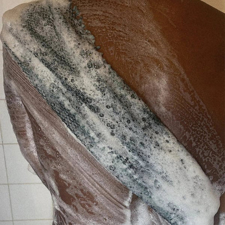 "Afrikanskt exfolieringsnät i nylon, blått, grovmaskigt för effektiv hudvård. Perfekt för hela kroppen, även svåråtkomliga om