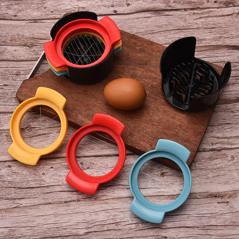 "Äggskärare i rostfritt stål och ABS, elegant design, med ergonomiskt handtag, perfekt för enkel äggskivning."