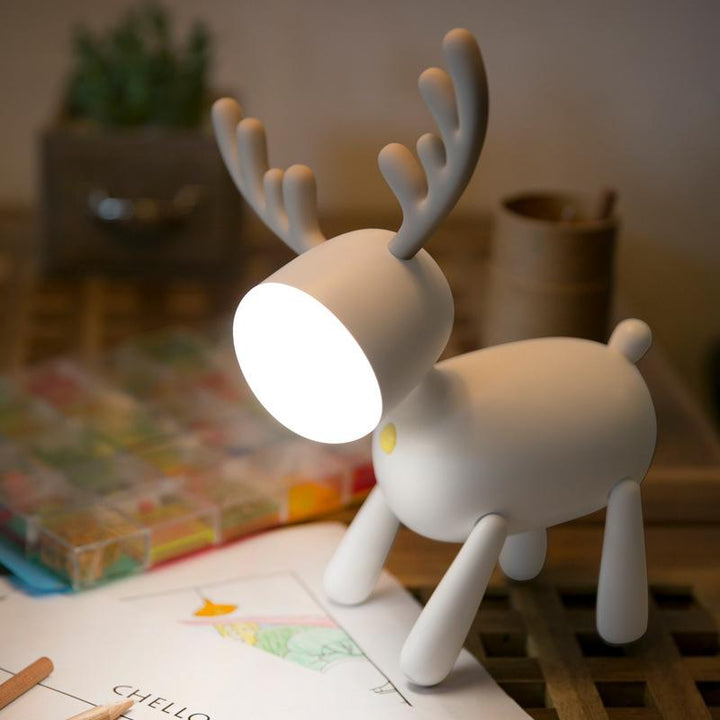"Älg nattlampa för barnrum, 360-graders justerbar, vit och mjuk belysning, bärbar bordslampa, med trendig design."