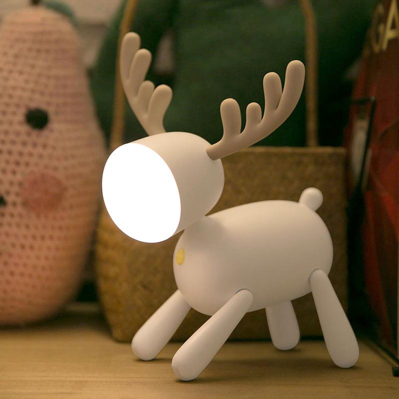 "Älg nattlampa för barnrum, 360-graders justerbar, vit och mjuk belysning, bärbar bordslampa, med trendig design."