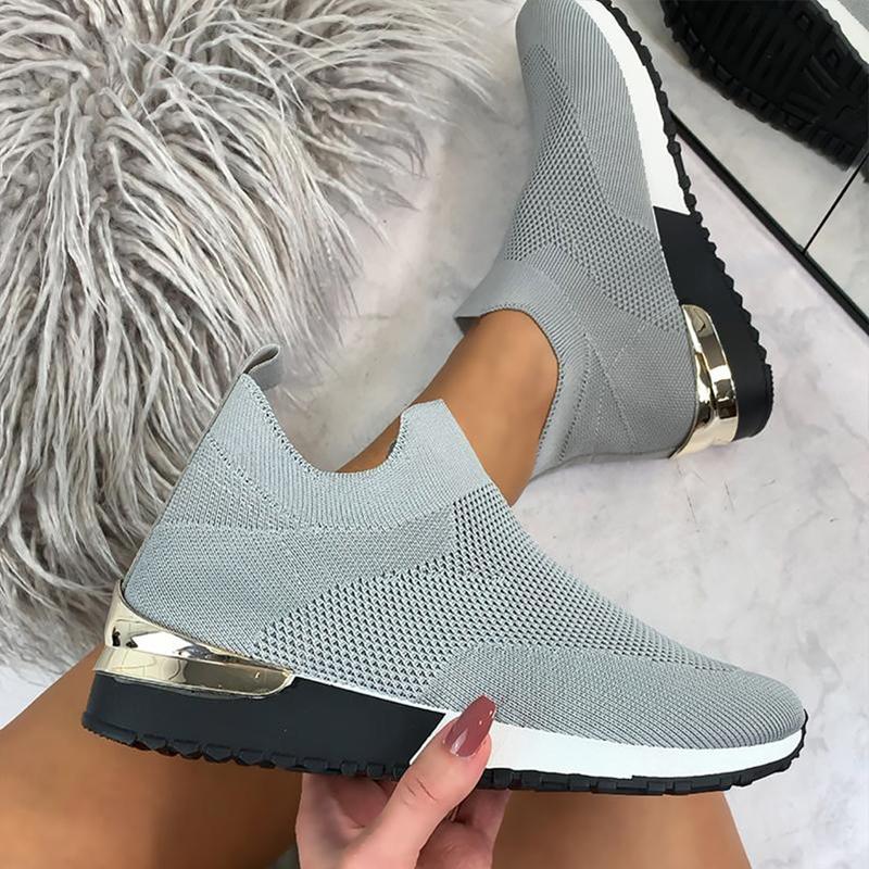 "Andas lättviktiga damskor med mesh och gummisula, elastisk slip-on design, perfekt för daglig komfort."