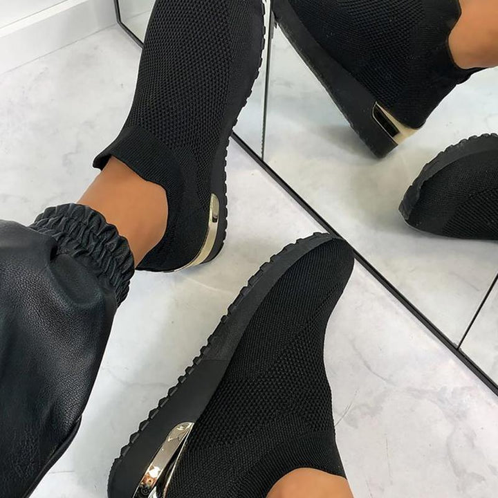 "Andas lättviktiga damskor med mesh och gummisula, elastisk slip-on design, perfekt för daglig komfort."
