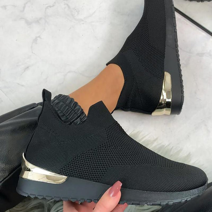 "Andas lättviktiga damskor med mesh och gummisula, elastisk slip-on design, perfekt för daglig komfort."