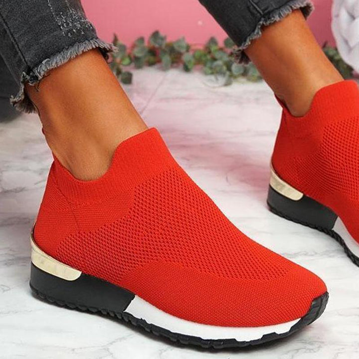 "Andas lättviktiga damskor med mesh och gummisula, elastisk slip-on design, perfekt för daglig komfort."