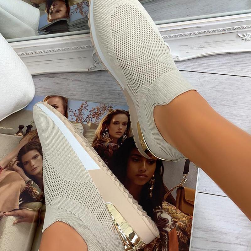 "Andas lättviktiga damskor med mesh och gummisula, elastisk slip-on design, perfekt för daglig komfort."