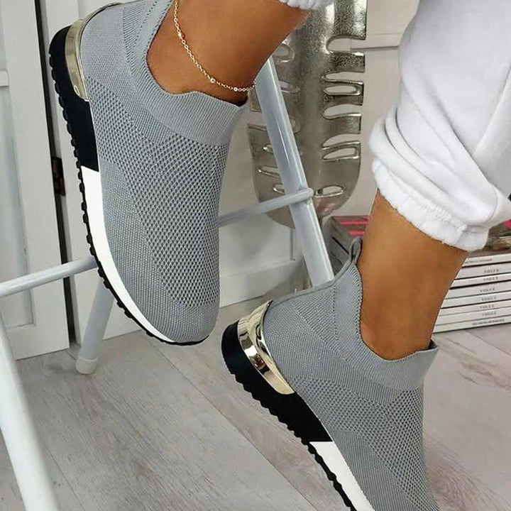 "Andas lättviktiga damskor med mesh och gummisula, elastisk slip-on design, perfekt för daglig komfort."