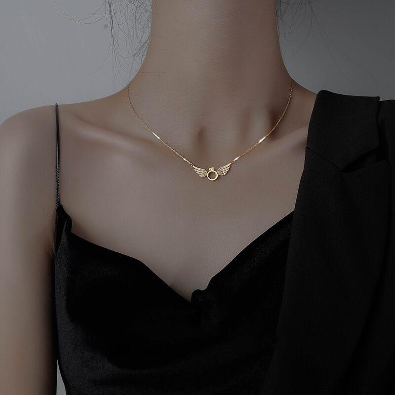 "Ängelvinge halsband för kvinnor, silver och guld, med flytande diamant, elegant änglavingeform, justerbart 45-50 cm"