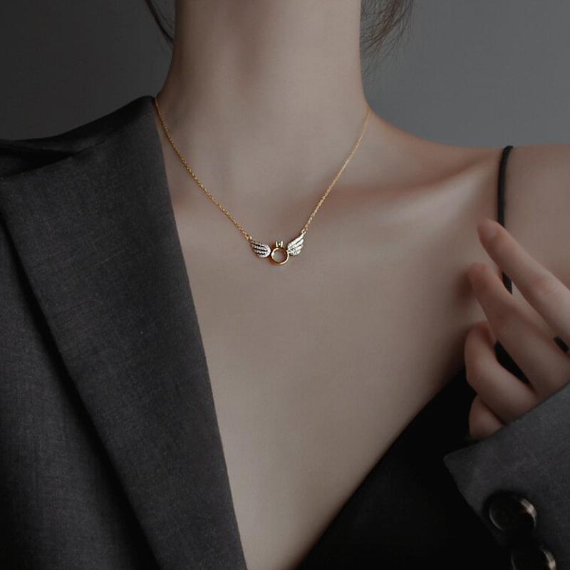 "Ängelvinge halsband för kvinnor, silver och guld, med flytande diamant, elegant änglavingeform, justerbart 45-50 cm"