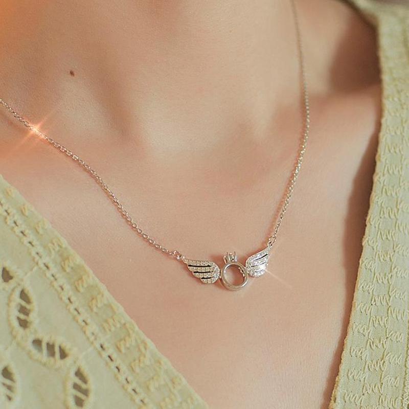 "Ängelvinge halsband för kvinnor, silver och guld, med flytande diamant, elegant änglavingeform, justerbart 45-50 cm"