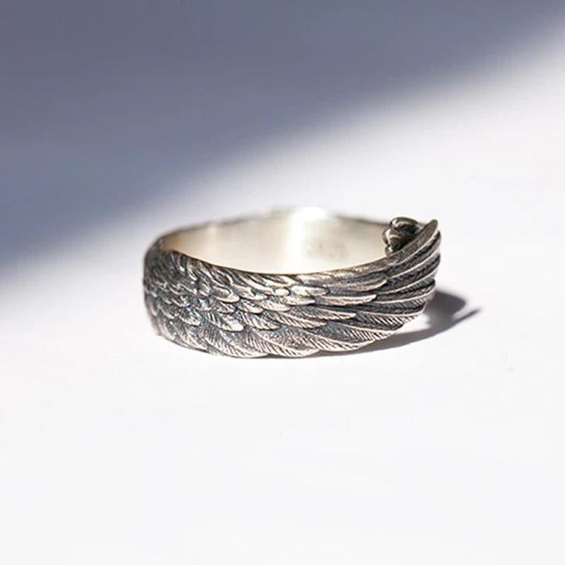 "Änglavinge ring i silver för kvinnor med justerbar storlek, elegant design, symboliserar hopp och kärlek, nickfri."
