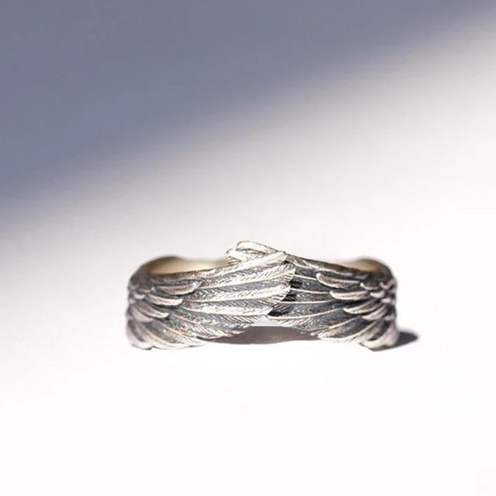 "Änglavinge ring i silver för kvinnor med justerbar storlek, elegant design, symboliserar hopp och kärlek, nickfri."