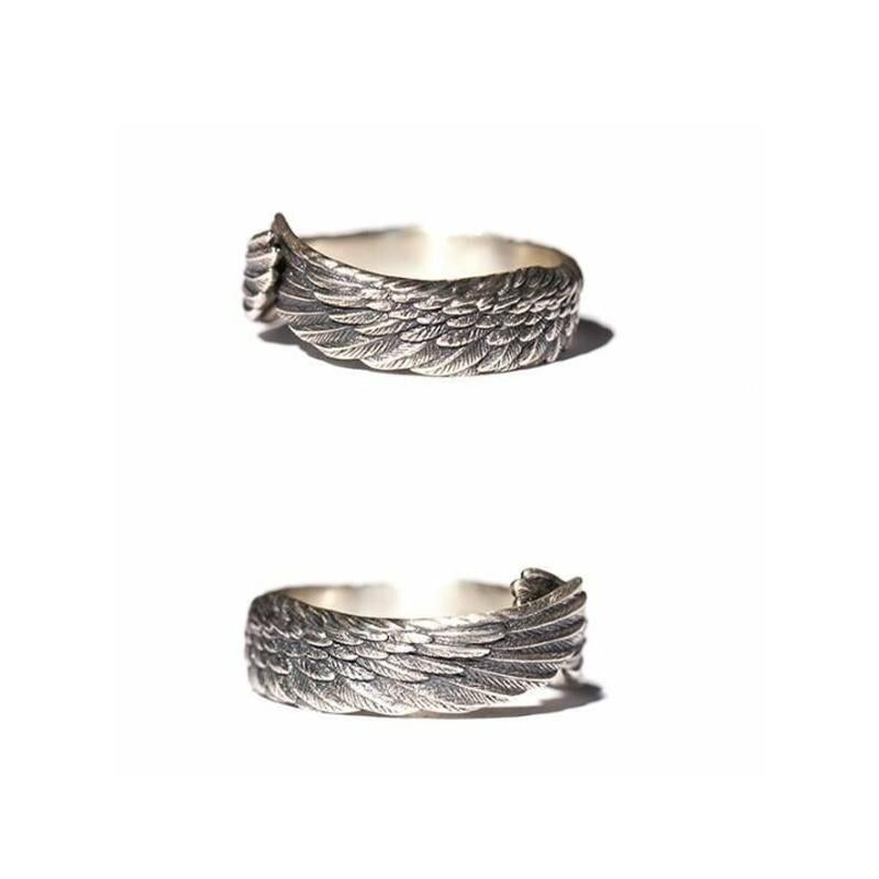 "Änglavinge ring i silver för kvinnor med justerbar storlek, elegant design, symboliserar hopp och kärlek, nickfri."