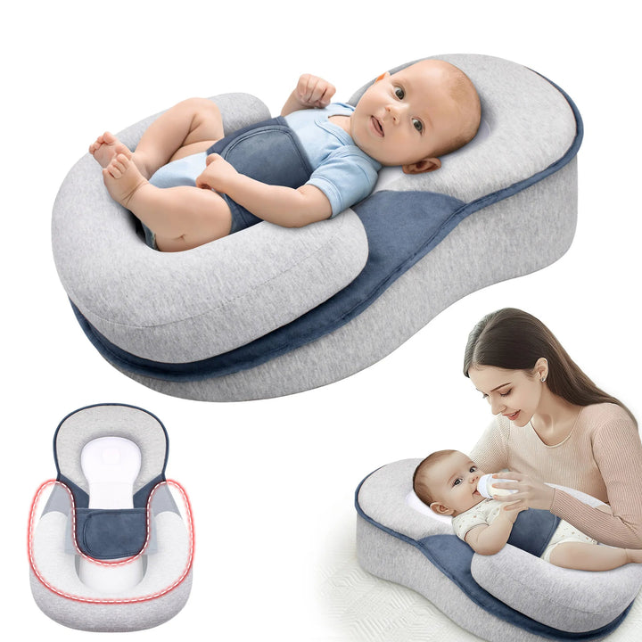 Anti-reflux baby lounger för nyfödda, ger lugnande vila och stöd.