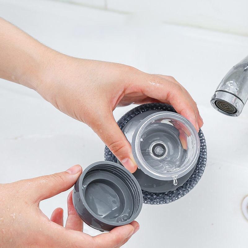 "Antibakteriell handflatansborste med inbyggd dispenser, rostfritt stålborst och ergonomisk design för effektiv köksrengöring