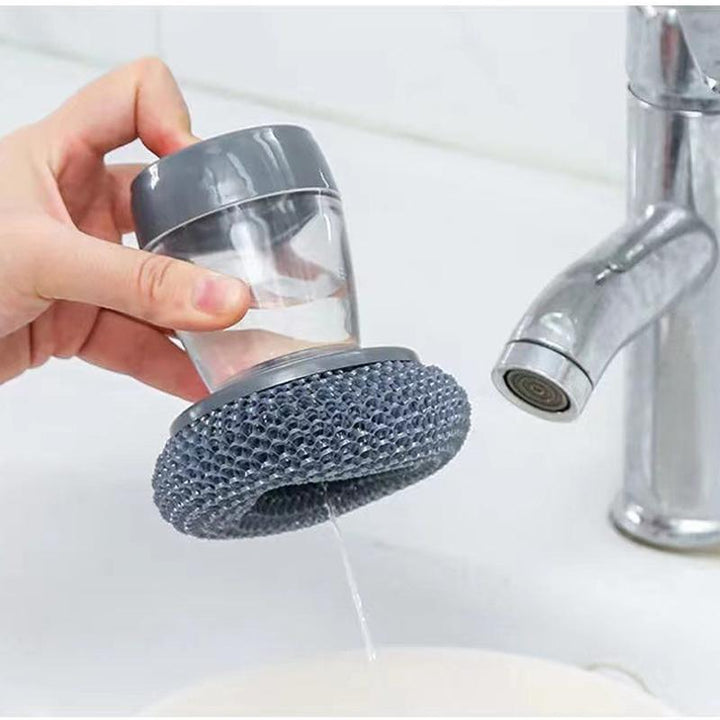 "Antibakteriell handflatansborste med inbyggd dispenser, rostfritt stålborst och ergonomisk design för effektiv köksrengöring