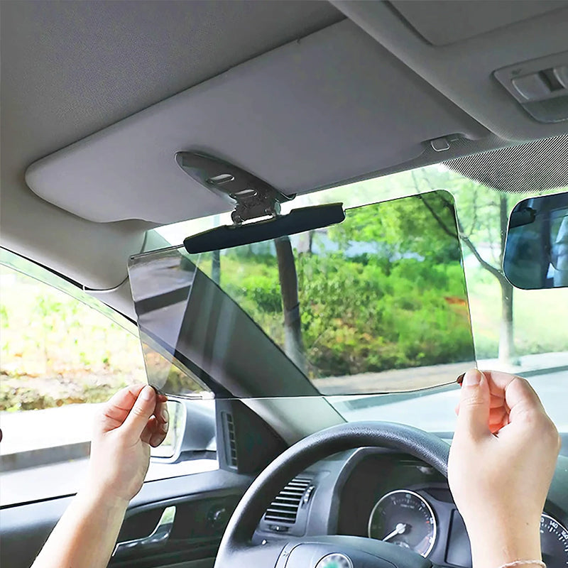 "Antireflex solskydd för bil, transparent design, blockerar solljus effektivt. Enkel installation för bättre sikt."