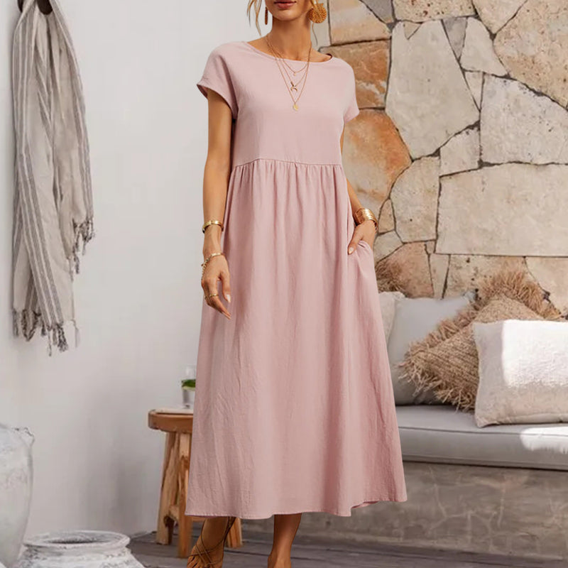 "Ärmfri bomullslinne A-linje sommarklänning för kvinnor i solid färg med klassisk design och rund hals."