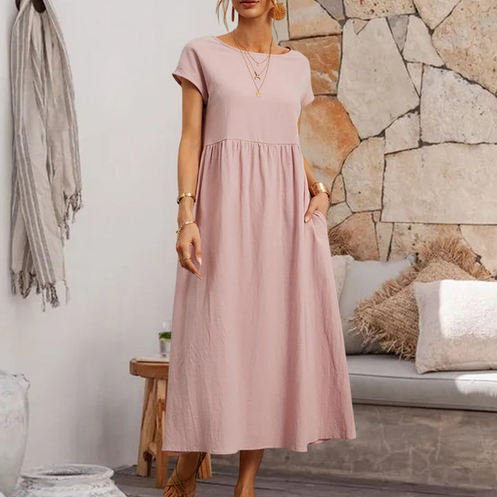 "Ärmfri bomullslinne A-linje sommarklänning för kvinnor i solid färg med klassisk design och rund hals."