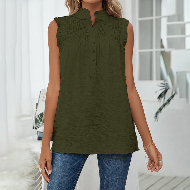 "Ärmfri damtopp med veck och knappar i ljusgrön, sommarstil. Perfekt för stranddagar och kvällar. Material: polyester."