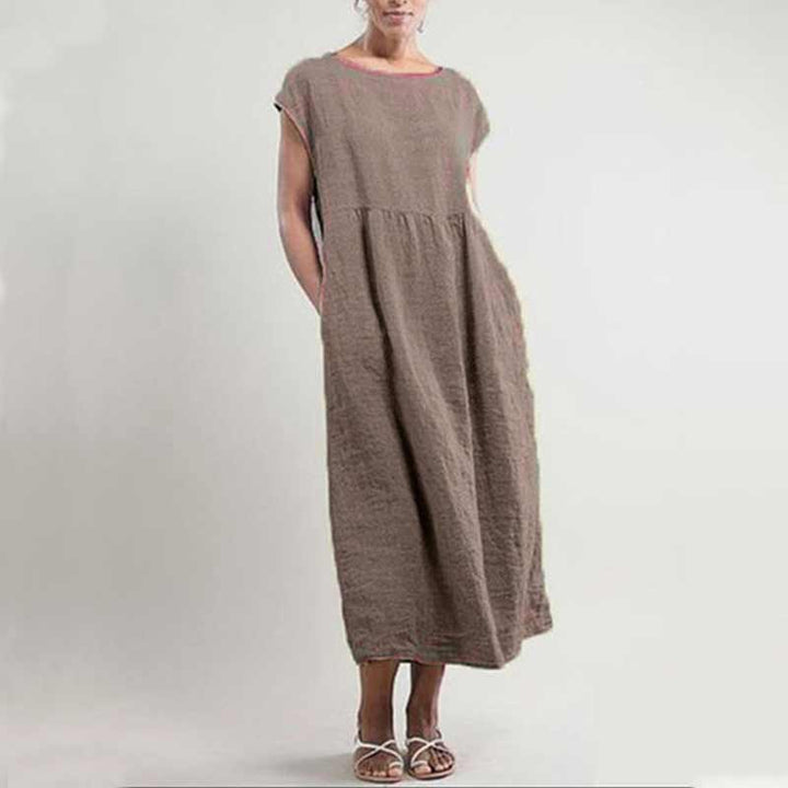 "Ärmlös sommarklänning för kvinnor med ficka i A-linje, lätt polyester, chic stil, flera färger, smickrande passform."