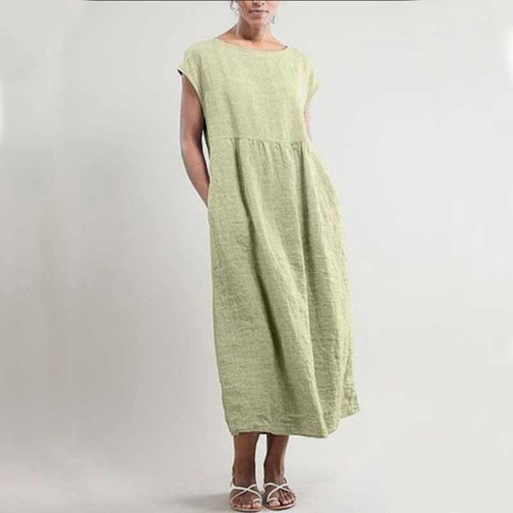 "Ärmlös sommarklänning för kvinnor med ficka i A-linje, lätt polyester, chic stil, flera färger, smickrande passform."