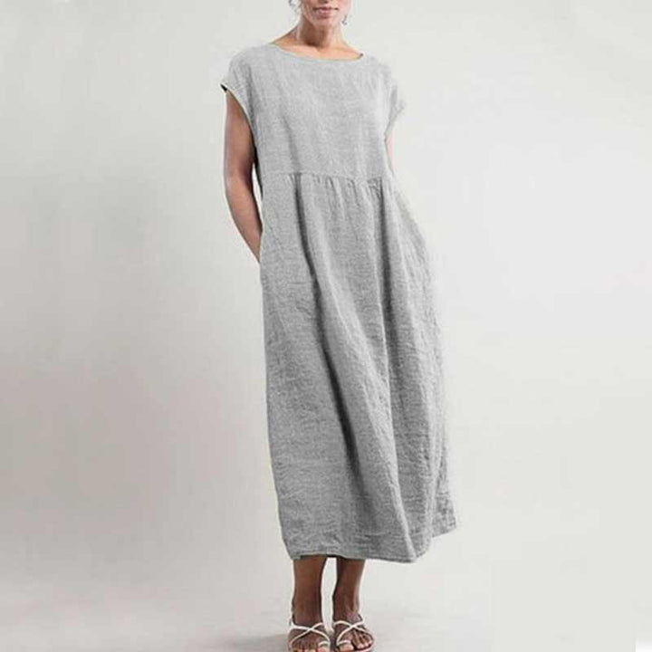 "Ärmlös sommarklänning för kvinnor med ficka i A-linje, lätt polyester, chic stil, flera färger, smickrande passform."