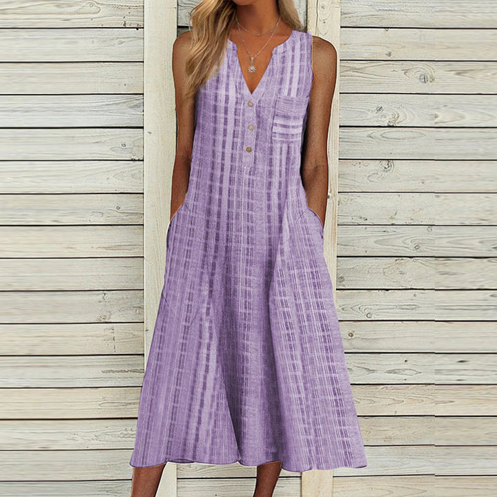 Ärmlös v-ringad damklänning med randig midikjol, smickrande sommarstil; ideal för både vardag och fest.
