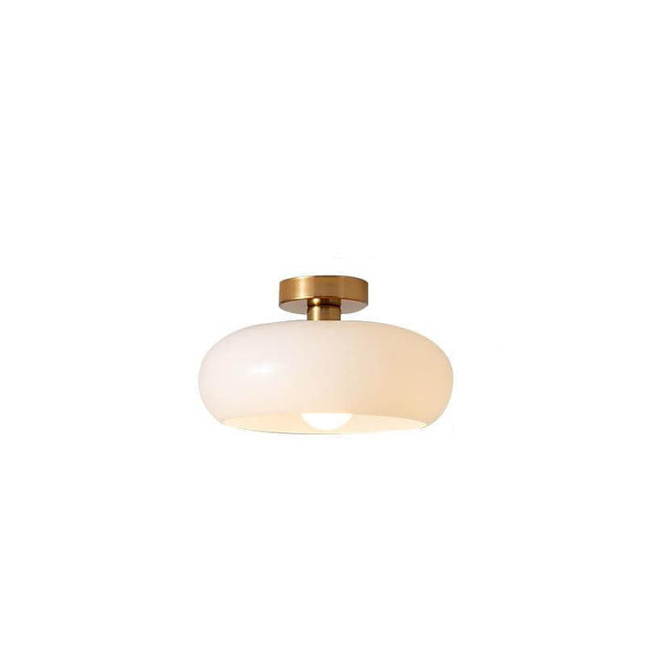 Elegant Art Deco taklampa, rund form. Ger varm och inbjudande belysning i ditt hem.