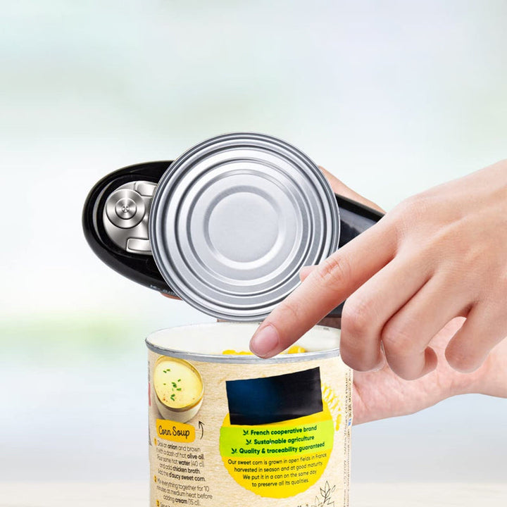 Automatisk konservöppnare i rostfritt stål, elegant silver design. Enkel kökshjälp för snabb burköppning.