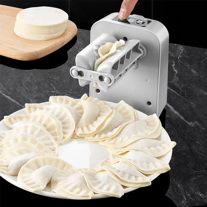 Kompakt köksredskap: Automatisk raviolimaskin för att göra färska dumplings & ravioli med lätthet. Hushållsapparat.