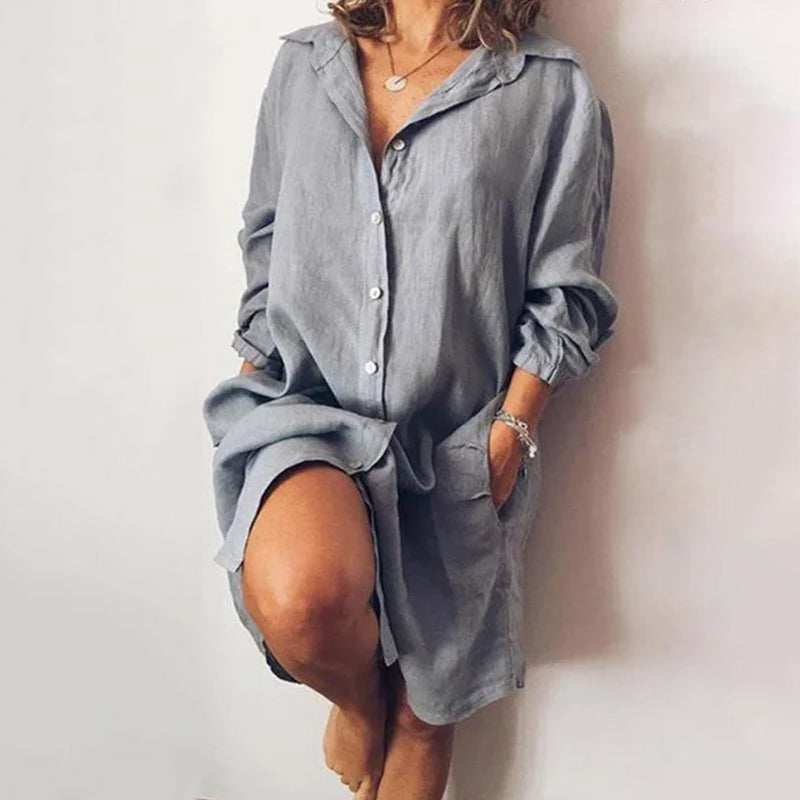 "Avslappnad damblus i ren färg med skjortkrage, långärmad, enfärgad, casual stil för vår och sommar."