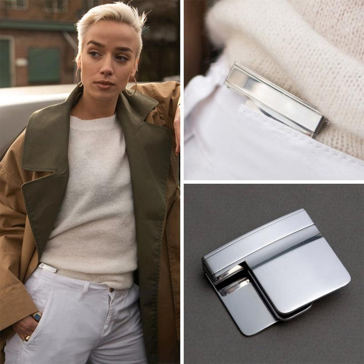 "Bältesjusteringsklämma i silver, kompakt och diskret design, ger perfekt passform för byxor och kjolar, elegant accessoar."