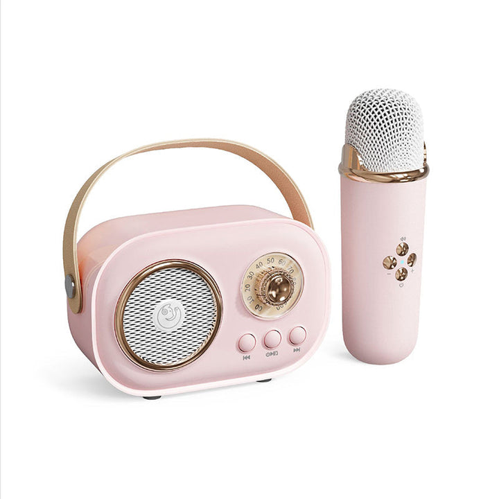 "Bärbar Bluetooth-högtalare för barn med trådlös mikrofon, kompakt design, perfekt för karaoke och musikupplevelser."