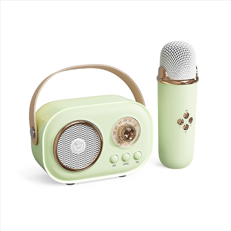 "Bärbar Bluetooth-högtalare för barn med trådlös mikrofon, kompakt design, perfekt för karaoke och musikupplevelser."